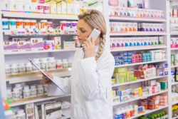 pharmacist using telephone